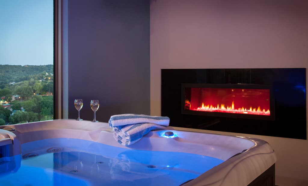 hot tub with fireplace