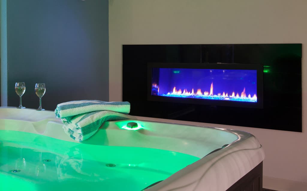 hot tub with fireplace