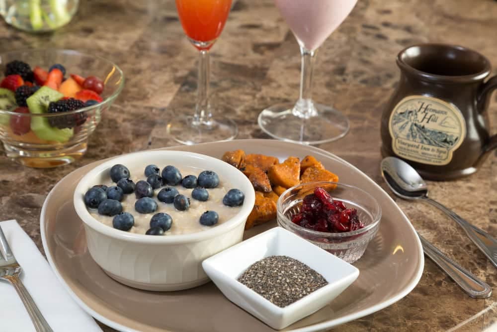 Wellness spa breakfast: Oatmeal with berries on a table